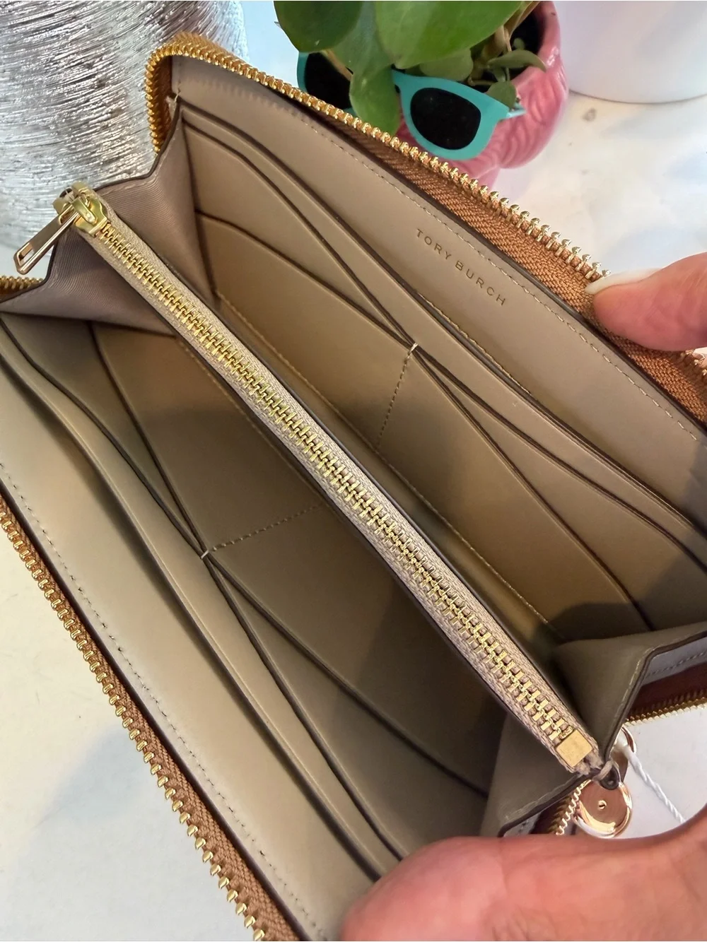 Tory Burch sleek zip